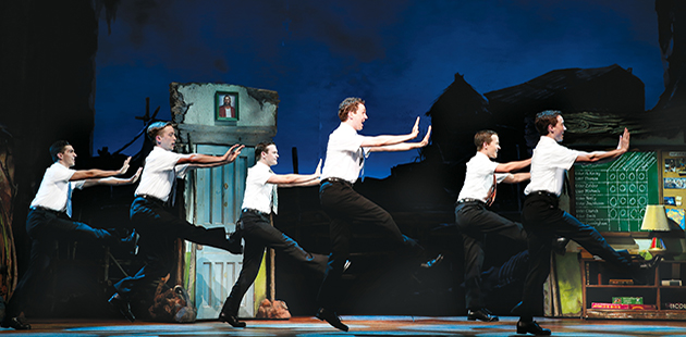 The Book of Mormon Rowan Witt as Elder McKinley and company - photo by Jeff Busby