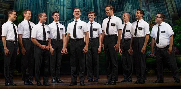 Blake Bowden (centre), Nyk Bielak (far right) and ensemble in The Book of Mormon - photo by Jeff Busby